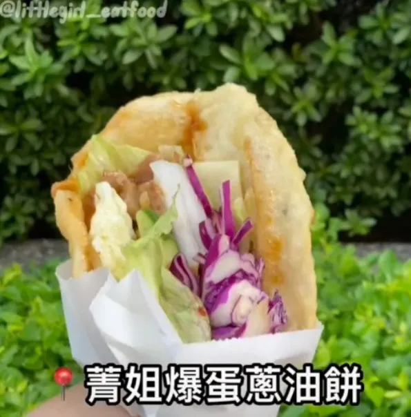 美食小吃「菁姐爆蛋蔥油餅」位在台中北區。TikTok：littlegirl_eatfood / IG：littlegirl_eatfood 提供