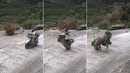 路邊木柴飛「機車跟著飛」 女騎士詭異180度後翻摔車