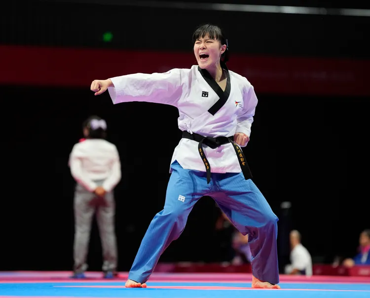 陳歆雅8強賽勝出。中華奧會