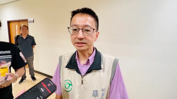 疾管署副署長羅一鈞希望在中秋節前壓制住疫情。讀者提供