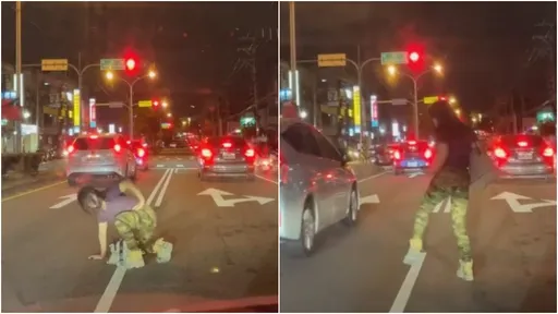 中邪?女子跪爬快車道扭腰擺臀 長髮掩面瞪視嚇壞人