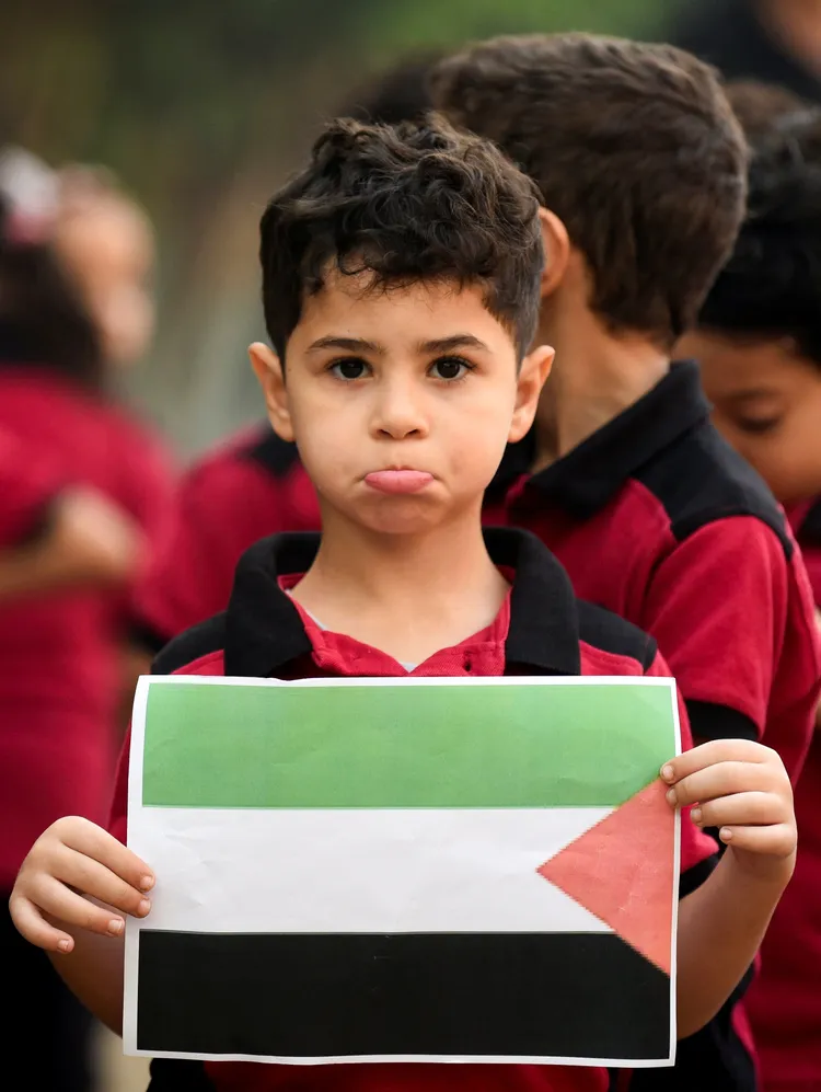 埃及兒童在開羅支持巴勒斯坦。路透社