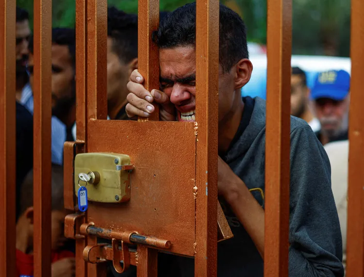 巴勒斯坦青年咬牙切齒。路透社