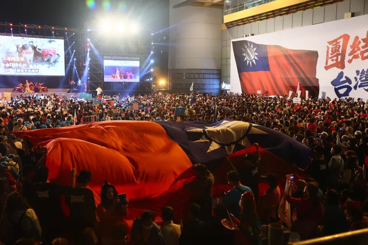 現場大國旗飄揚。彭欣偉攝