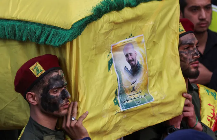 真主黨為近日戰死的成員舉行葬禮。路透社