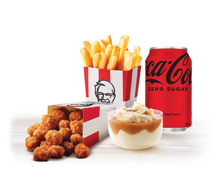 特大雞米花套餐可以滿足你一整天需要的卡路里與脂肪。沒錯！一整天的，除非你整天只吃這餐。