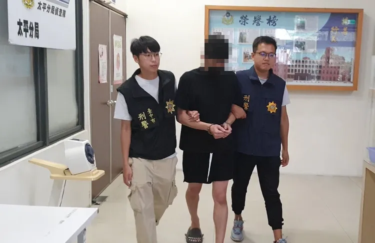 張男隱身台中大樓內透過通訊軟體幫人查個資牟利，警方鎖定位置上們抓人。翻攝畫面