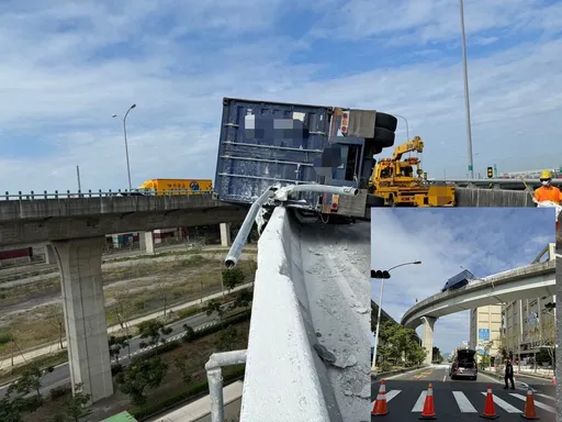 貨櫃車失控擦撞護欄側翻 命懸一線!車頭掛20公尺高架橋上