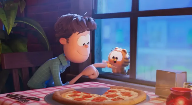 加菲貓和主人是這樣遇見的。翻攝Sony Pictures Entertainment的YouTube