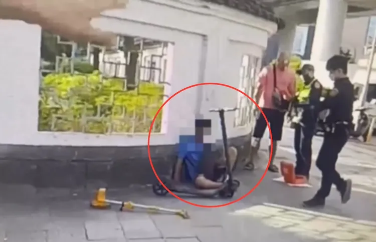 警方詢問謝男車禍狀況。翻攝畫面