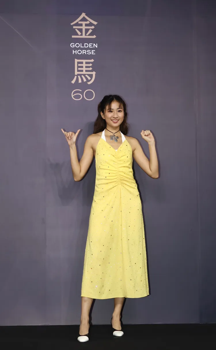 9m88黃色系洋裝現身。彭欣偉攝