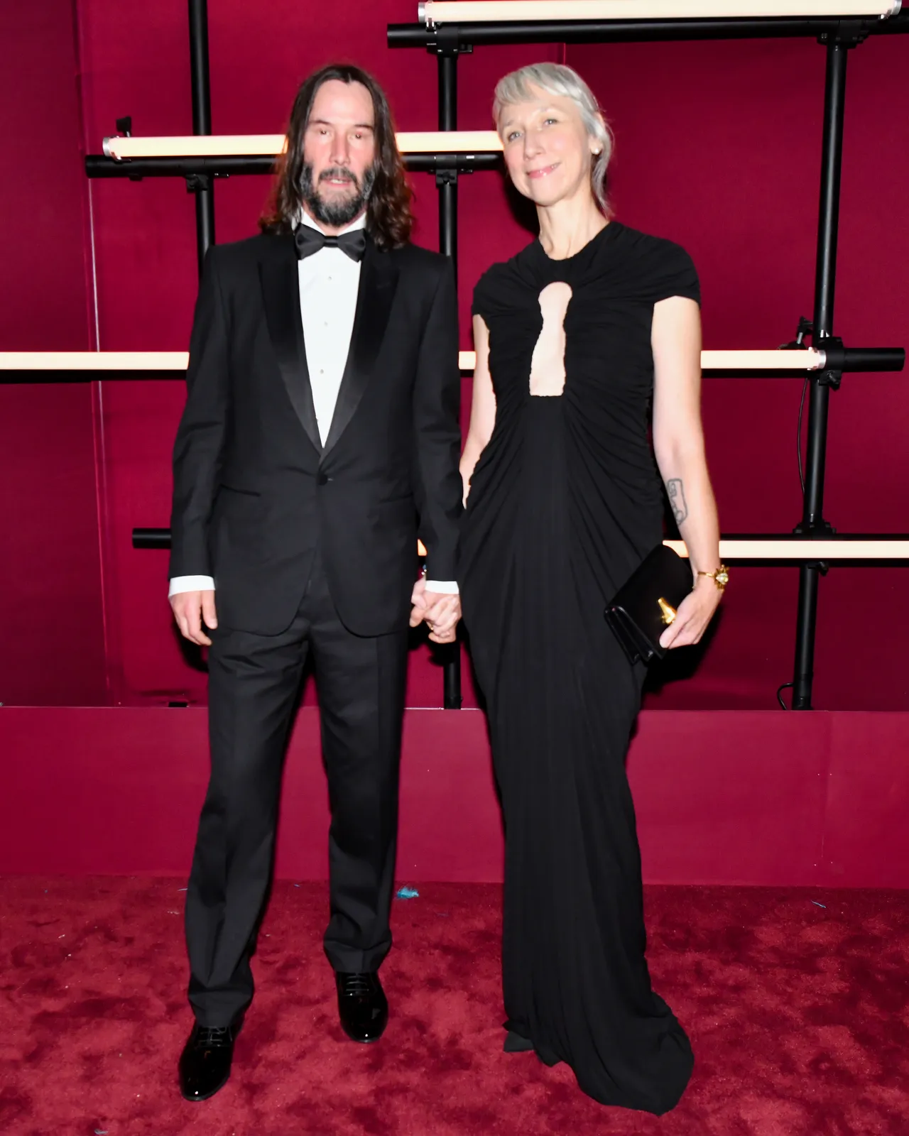 基努李維（左）與女友Alexandra Grant。品牌提供