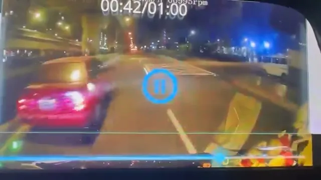 熱血駕駛將肇事紅色轎車劉姓駕駛攔下。民眾提供