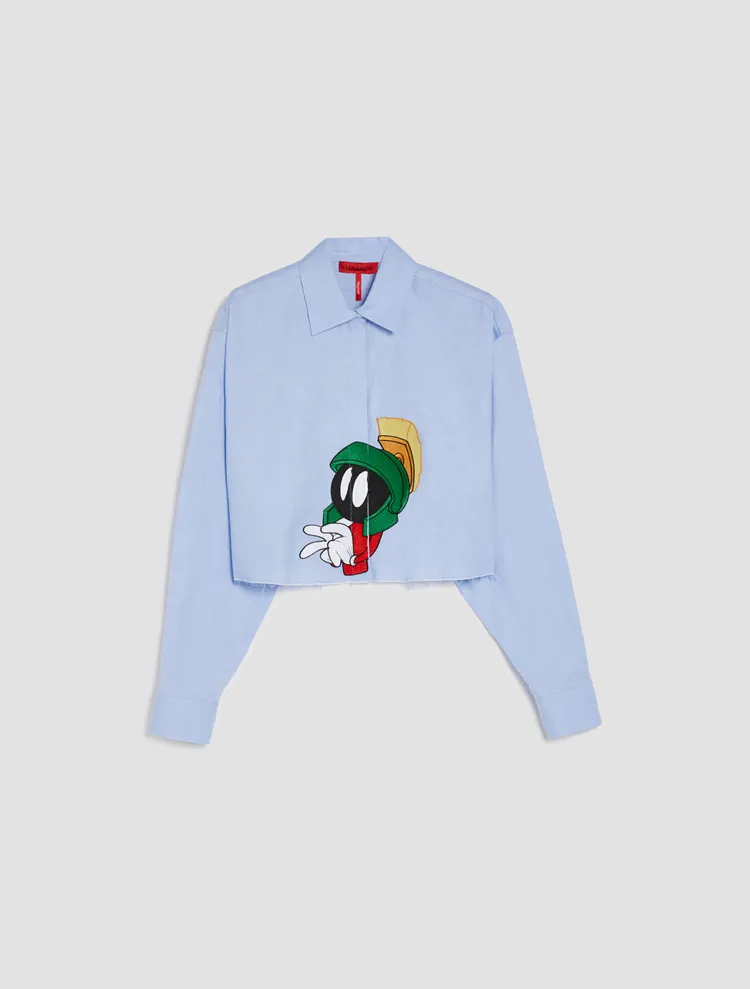 短版不收邊牛津布襯衫，1萬元。品牌提供