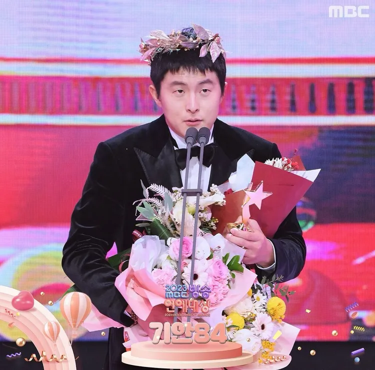 旗安84是首位非藝人拿到大獎。翻攝MBC