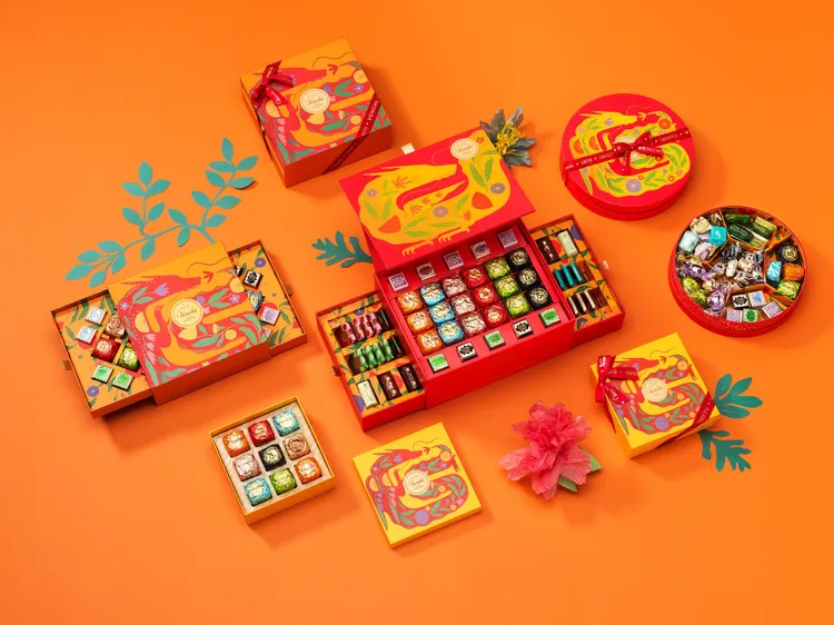 外盒包裝設計在大紅與金黃配色之中勾勒出龍身輪廓。品牌提供