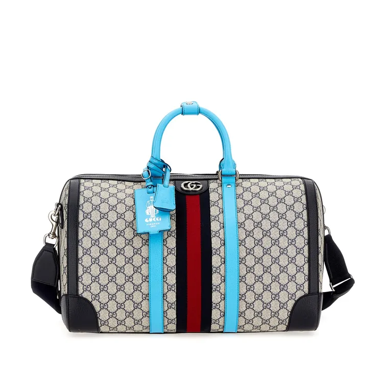 GUCCI新款螢光提把旅行包預計二月上市，未定價。品牌提供
