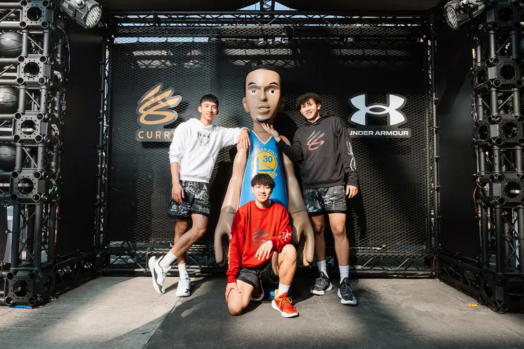 張俊生（左起）、宋瑞蓁、陳將双演繹全新的CURRY 11 X BRUCE LEE聯名籃球鞋。品牌提供