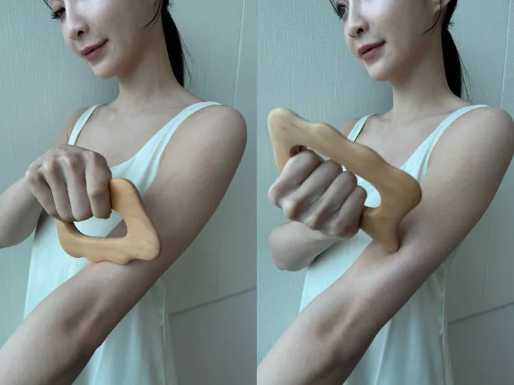 Model示範木質活力紓壓按摩板使用方法。張家玲攝