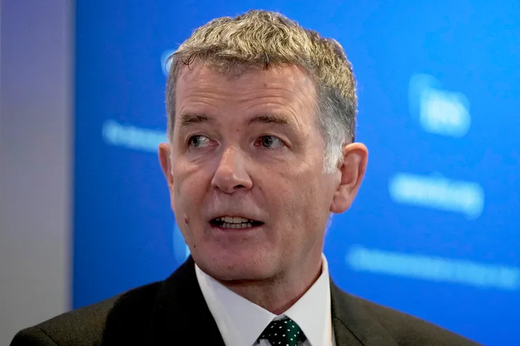 英國軍情六處局長摩爾。資料照片