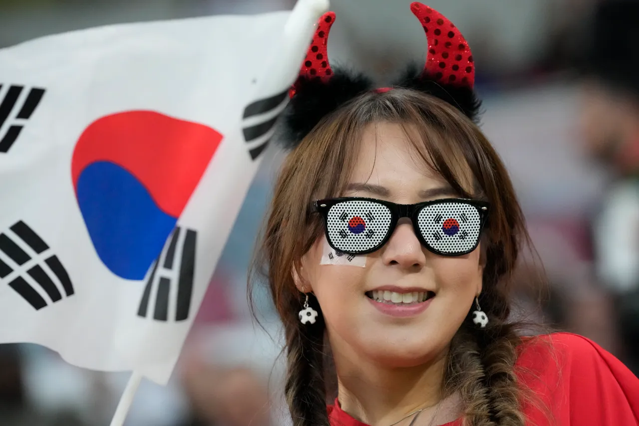 南韓球迷昨在卡達,為參加亞洲盃足球賽的國家隊加油。美聯社