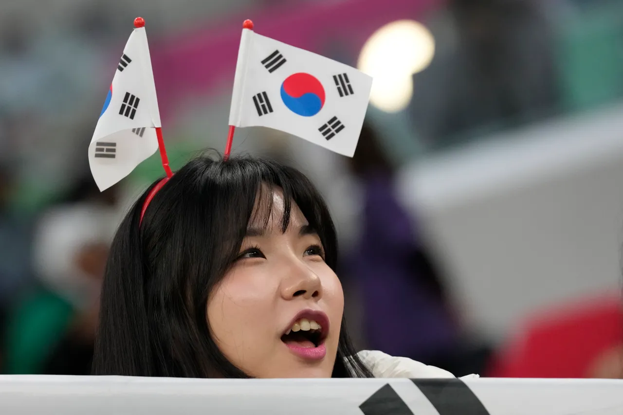 南韓球迷昨在卡達,為參加亞洲盃足球賽的國家隊加油。美聯社