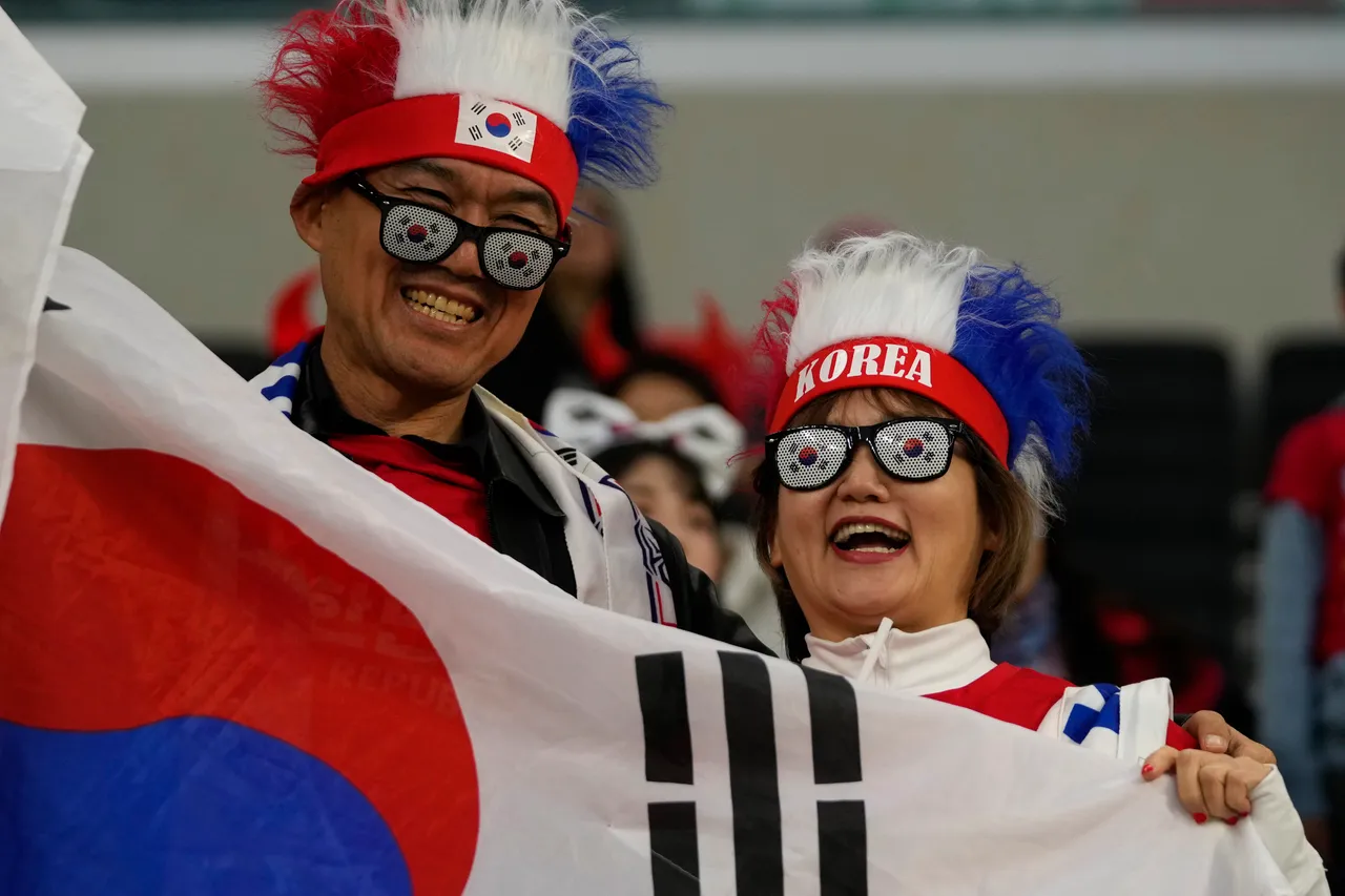 南韓球迷昨在卡達,為參加亞洲盃足球賽的國家隊加油。美聯社