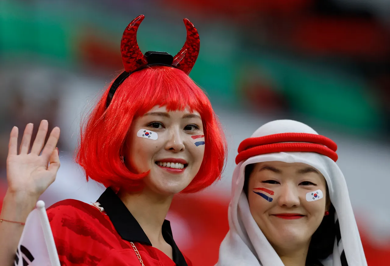 南韓球迷昨在卡達,為參加亞洲盃足球賽的國家隊加油。路透社