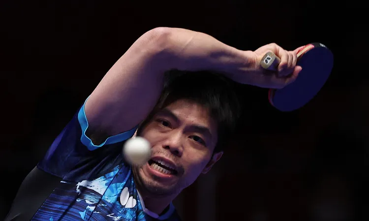 莊智淵帶領中華隊在南韓釜山參加世界桌球團體錦標賽；圖為今天對法國戰。路透社