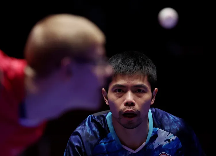 莊智淵帶領中華隊在南韓釜山參加世界桌球團體錦標賽；圖為今天對法國戰。路透社