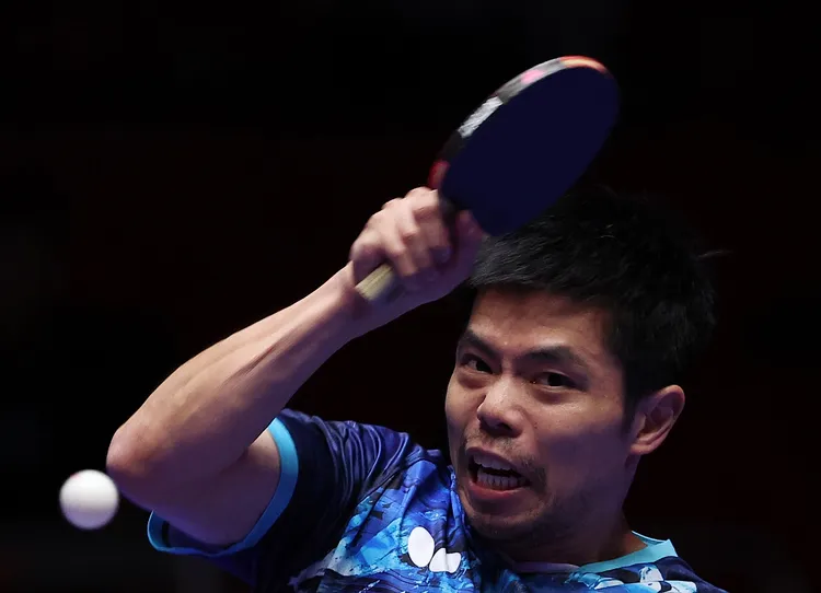 莊智淵帶領中華隊在南韓釜山參加世界桌球團體錦標賽；圖為今天對法國戰。路透社