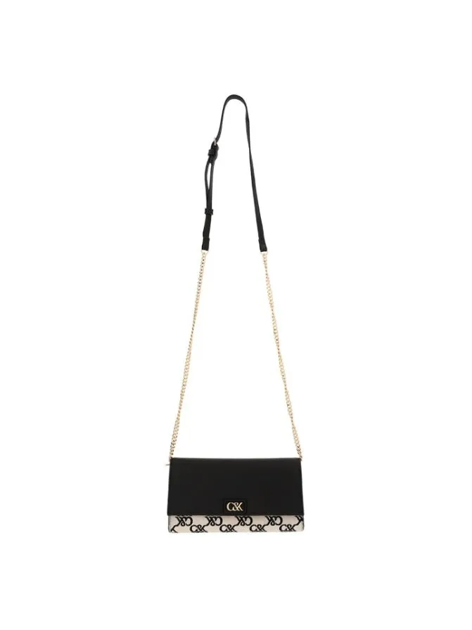 皮革帆布鍊帶長夾，2690元。品牌提供