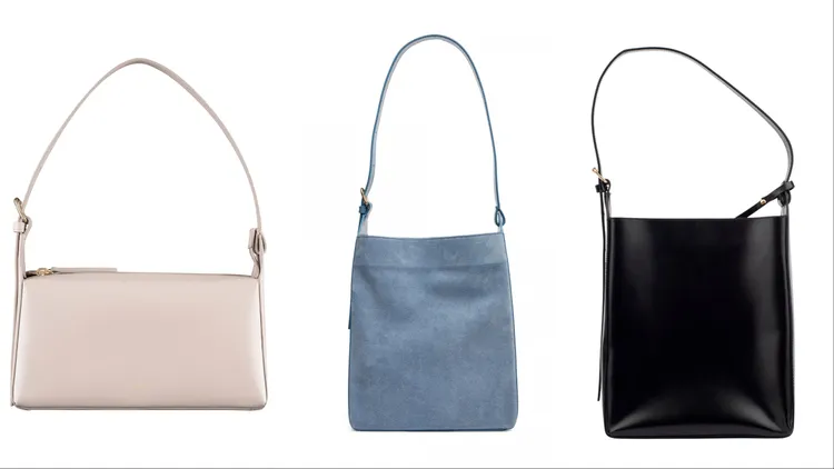 月灰色VIRGINE法棍肩背包（左起）2萬200元、藍色VIRGINIE異材質方桶肩背包2萬4200元、黑色VIRGINE方桶肩背包2萬4200元。品牌提供