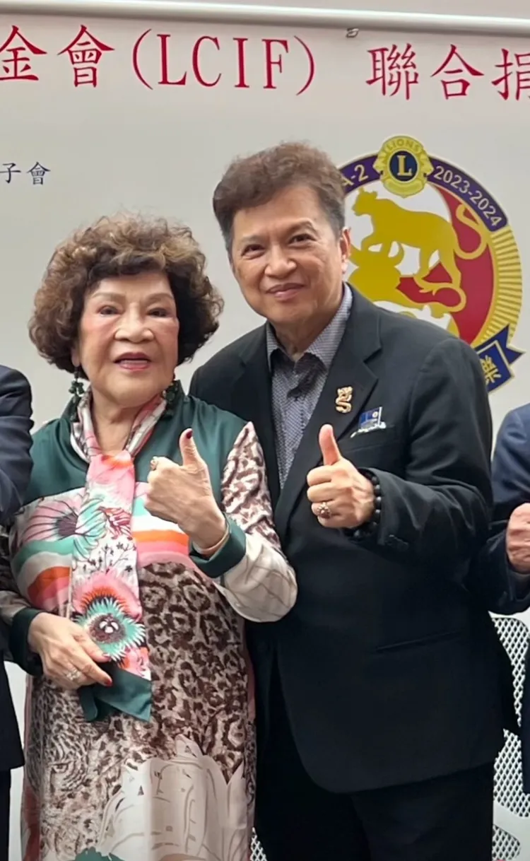 周遊（左）地震時有李朝永保護。李朝永提供