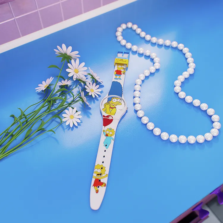 霸子、花枝、奶嘴3位小孩在錶帶上團聚。品牌提供