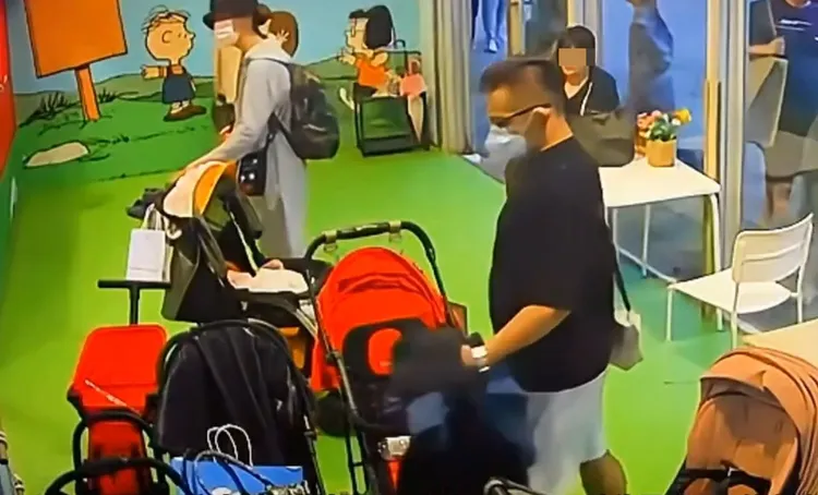 男子以外套遮掩行竊。翻攝社會事新聞影音