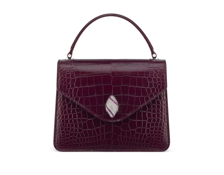 Aeterna Serpenti Pallini午夜莓果色鱷魚皮手提包。品牌提供