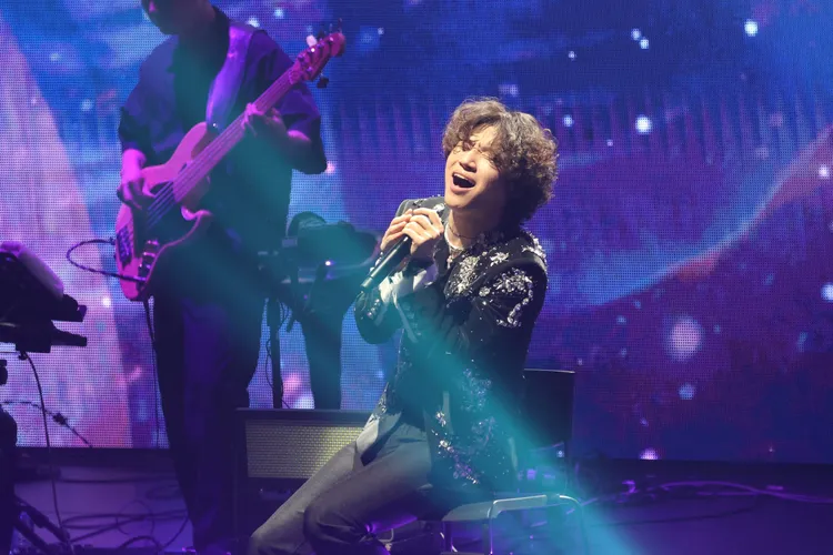 大聲的歌聲讓粉絲聽得如癡如醉。彭欣偉攝