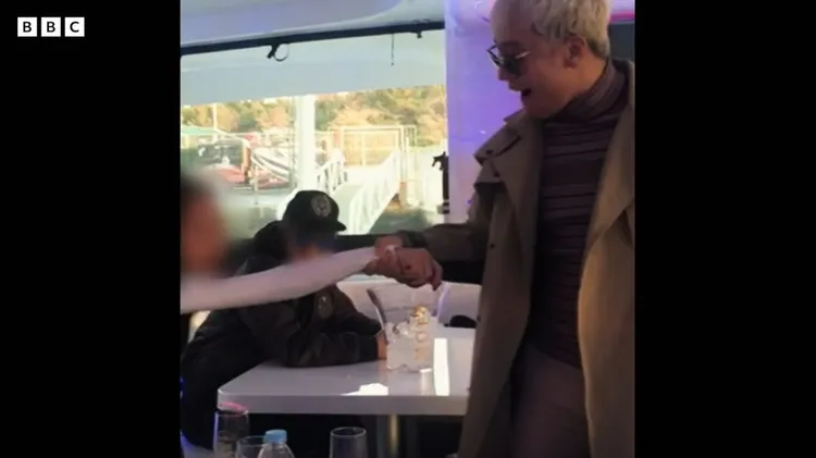 勝利在派對上強拉女子。翻攝BBC NEWS中文