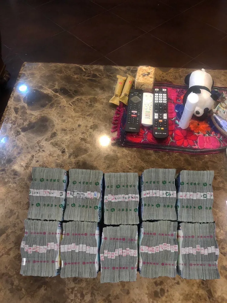 警方P圖一千萬現金，成功誘騙詐團派人取款。翻攝畫面