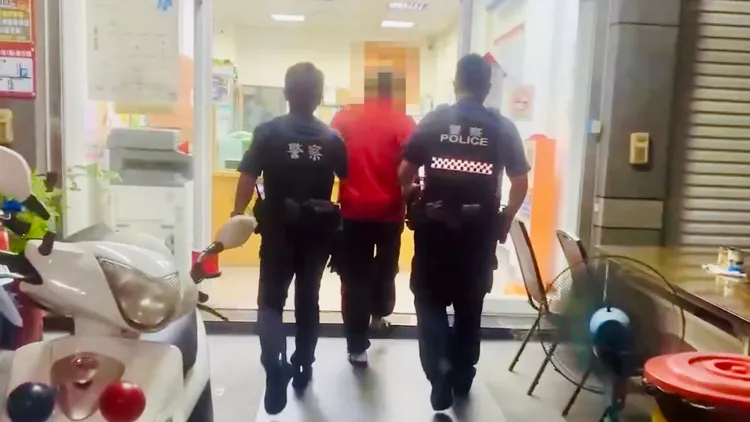 警方約談紅衣騎士葉姓男子到案。讀者提供