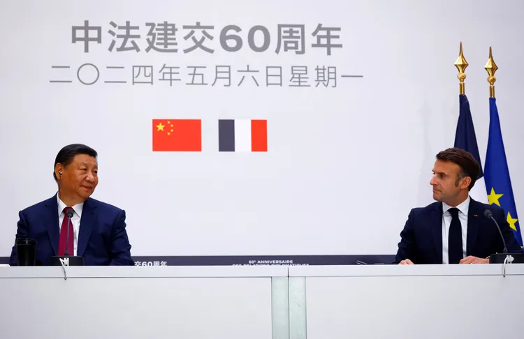 今年是中法建交60周年，中國國家主席習近平（左）出訪法國，並與法國總統馬克宏會談。美聯社