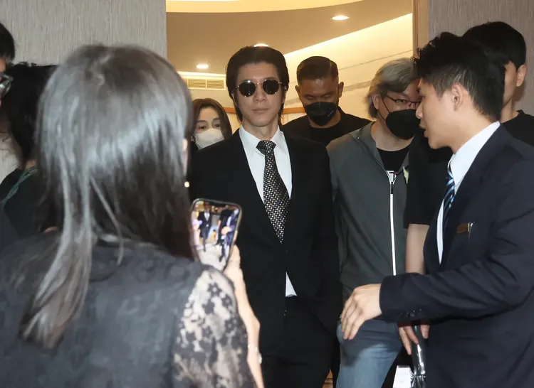 王力宏一身正裝現身靈堂。資料照片