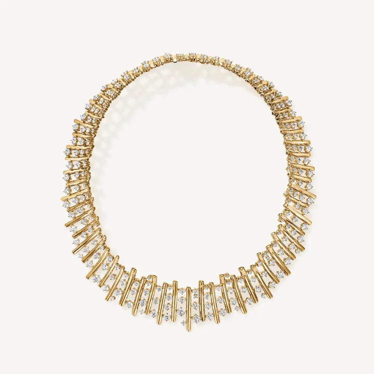 Hearts On Fire Barre Multi-Row 黃K金鑽石鎖骨鍊，鑽石總重約26.25克拉，509萬2000元。品牌提供