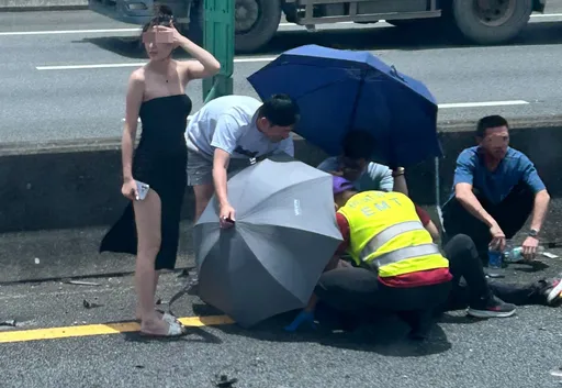 最美風景!「低胸高衩」正妹好熱心 國道下車幫車禍引導車流