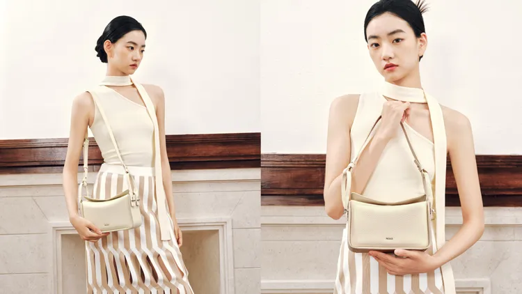 Demi皮革肩背包採用橫向長方形設計呈現。品牌提供