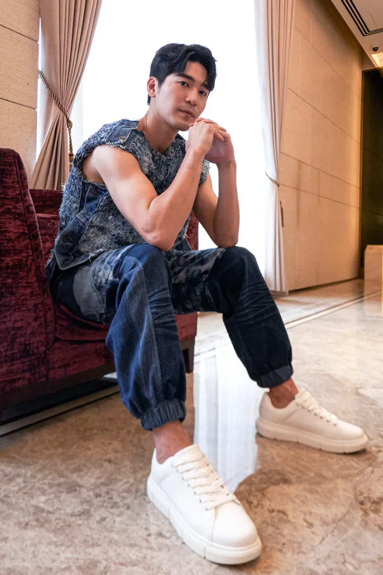 涂善存為走秀勤練手臂。美國棉提供