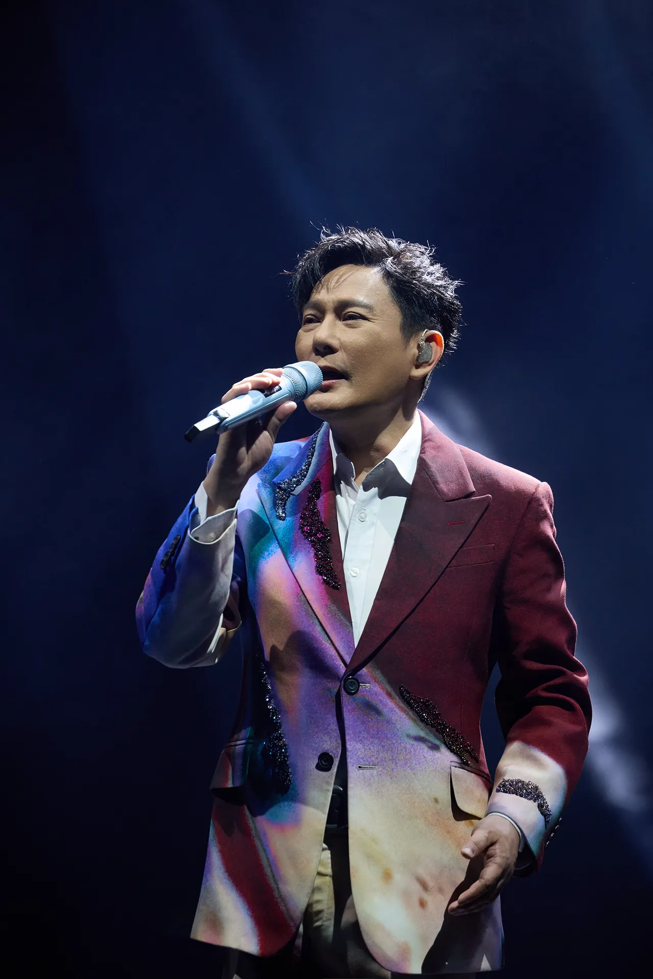 張信哲日前被問及在台北大巨蛋開唱一事。潮水音樂提供