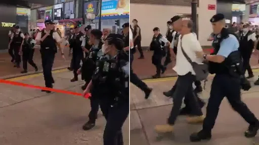 連白紙都沒拿！他朝空氣比劃「8964」　竟被港警包圍逮捕