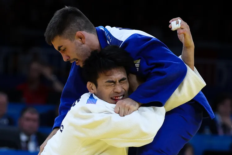 楊勇緯浴血奮戰。  中央社